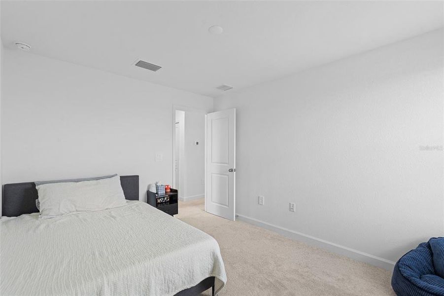 Furnished interior view inside a new home in Tuckers Cove: Villas, Punta Gorda (Image 14).