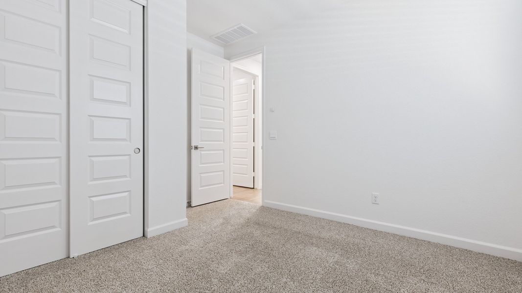 Spacious, unfurnished interior of a new home in Zanjero Pass, Waddell (Image 23).