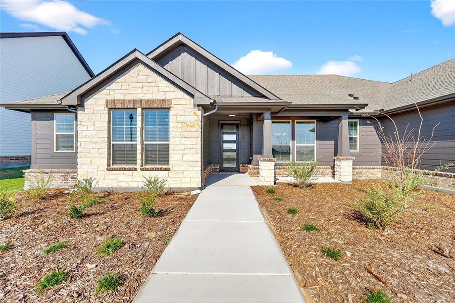 Front exterior of a new home in Fairview Meadows, New Fairview, TX, highlighting curb appeal (Image 20). Front exterior of a new home in Fairview Meadows, New Fairview, TX, highlighting curb appeal (Image 20).