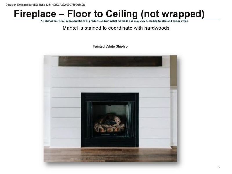 White shiplap fireplace in living room.