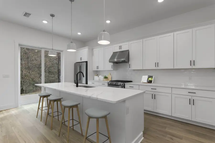 Representative furnished interior of a home built from the Piper by Brock Built in Nautilus Pointe, Inlet Beach (Image 15).