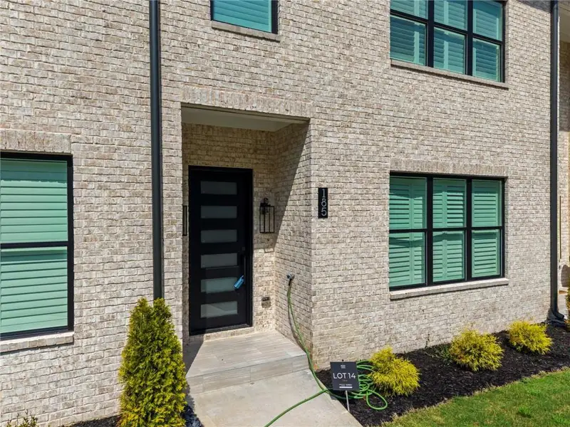 Exterior details and patio area of a home in , Stockbridge (Image 27).