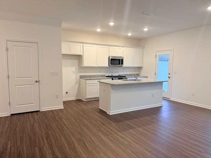 Kitchen - Chic white finishes and smooth surfaces shine. Kitchen - Chic white finishes and smooth surfaces shine.
