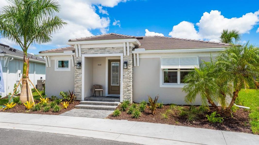 Exterior details and patio area of a home in Esplanade at Azario Lakewood Ranch, Lakewood Ranch (Image 25).