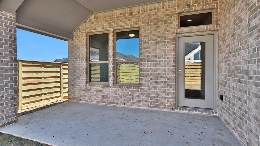 Exterior details and patio area of a home in Austin Point, Richmond (Image 3).