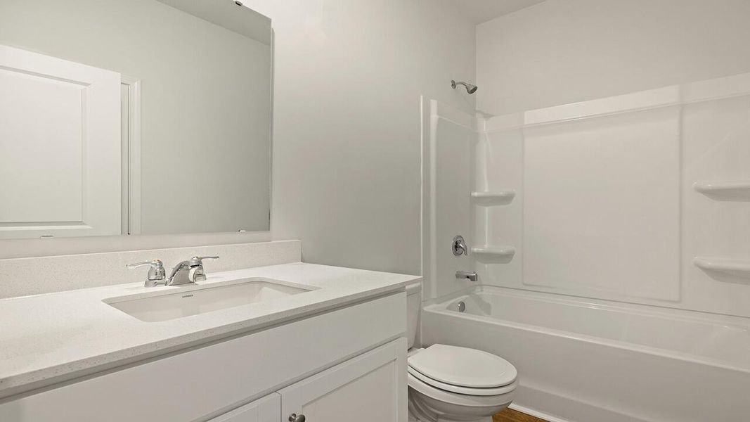 Furnished interior view inside a new home in Garbon Fields, Summerville (Image 14).