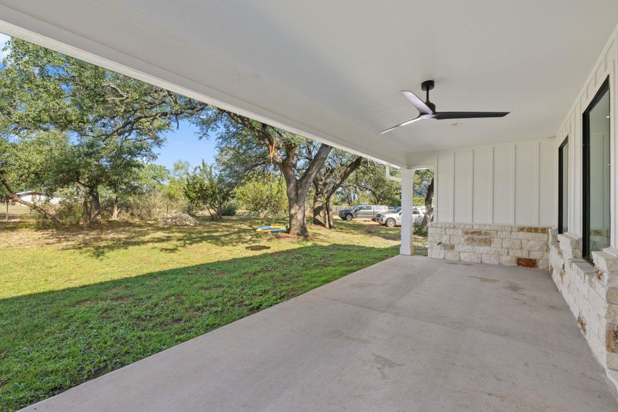 View of patio with ceiling fan