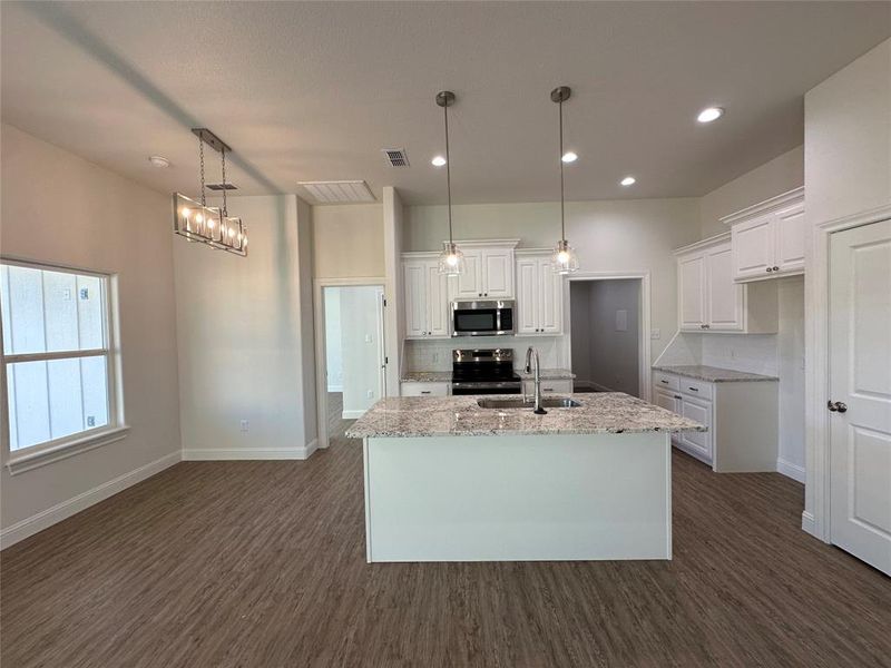 Furnished interior view inside a new home in , Abilene (Image 4).