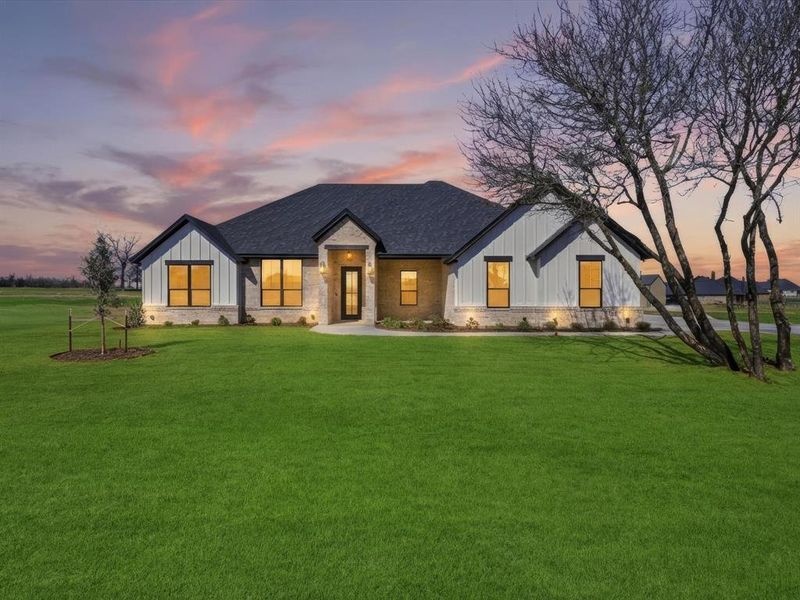 Front exterior of a new home in , Weatherford, TX, highlighting curb appeal (Image 1). Front exterior of a new home in , Weatherford, TX, highlighting curb appeal (Image 1).