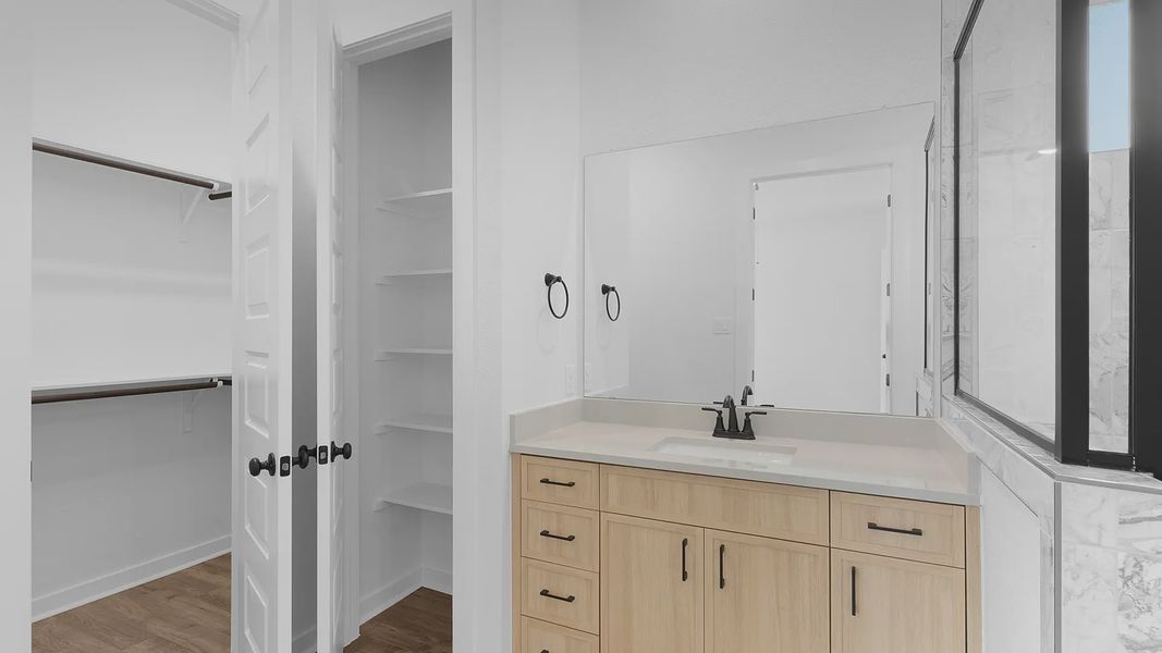 Representative furnished interior of a home built from the Acadia by Chesmar Homes in Crescent Bluff, Georgetown (Image 8).