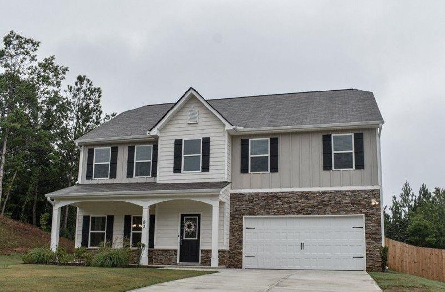 Front exterior of a new home in , Dallas, GA, highlighting curb appeal (Image 28). Front exterior of a new home in , Dallas, GA, highlighting curb appeal (Image 28).