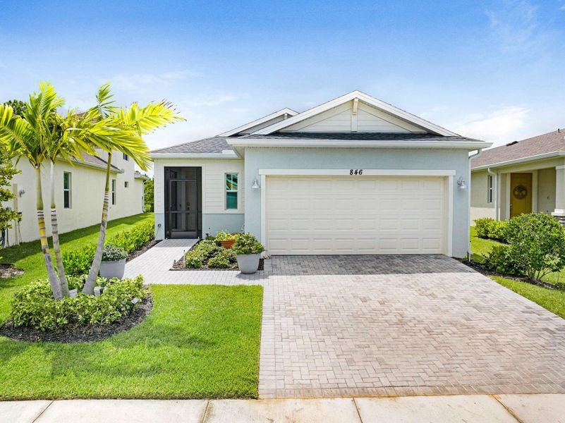 Front exterior of a new home in , Melbourne, FL, highlighting curb appeal (Image 20). Front exterior of a new home in , Melbourne, FL, highlighting curb appeal (Image 20).