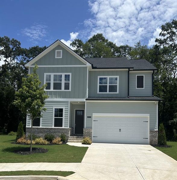 Front exterior of a new home in Red Bird Manor, Jefferson, GA, highlighting curb appeal (Image 1). Front exterior of a new home in Red Bird Manor, Jefferson, GA, highlighting curb appeal (Image 1).