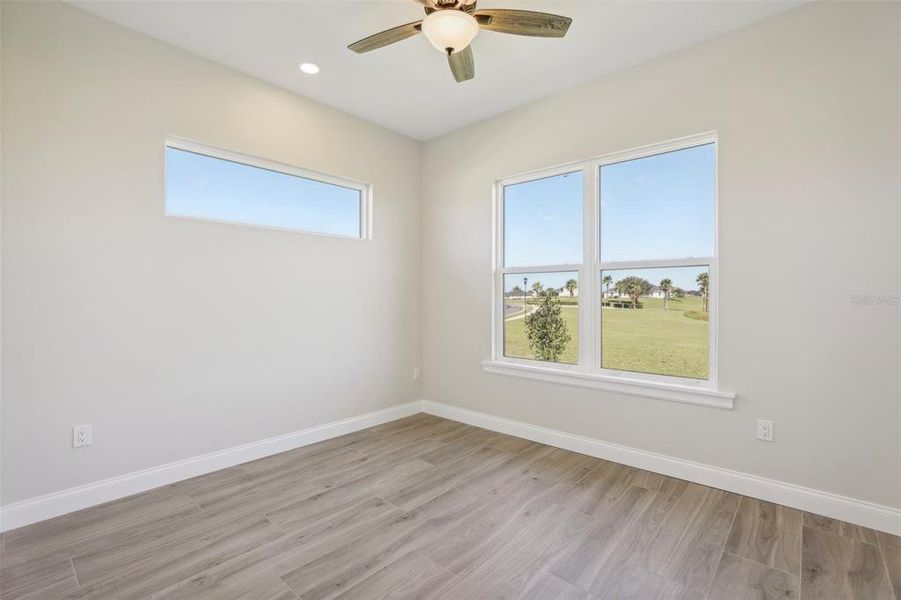 Bedroom # 2 with a lake  & Green Landscape view