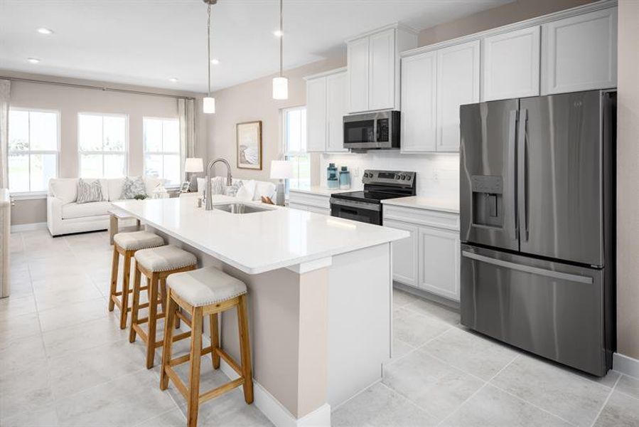 Representative furnished interior of a home built from the Allegro by Ryan Homes in Lake Mattie Preserve Townhomes, Auburndale (Image 3).