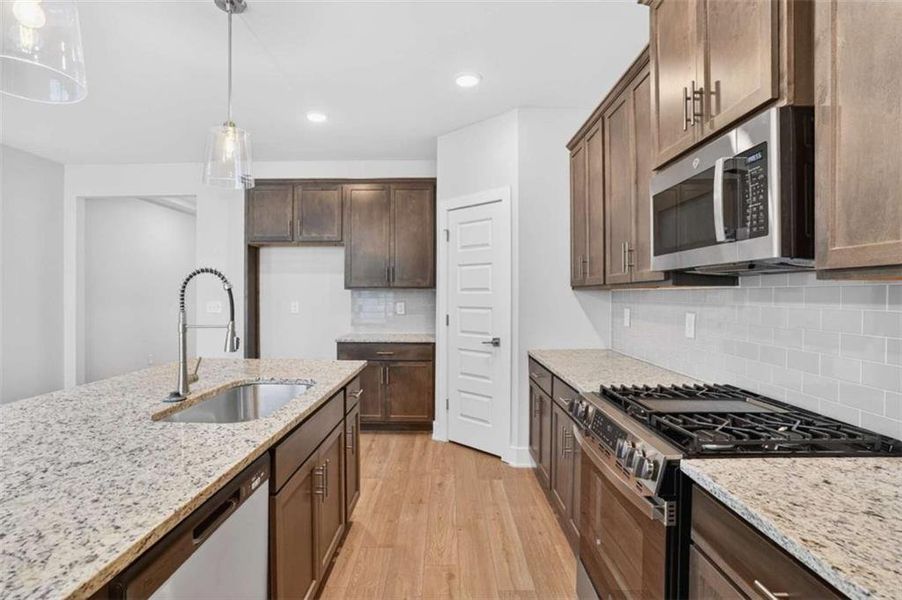 Furnished interior view inside a new home in The Fairways at Mirror Lake, Villa Rica (Image 10).