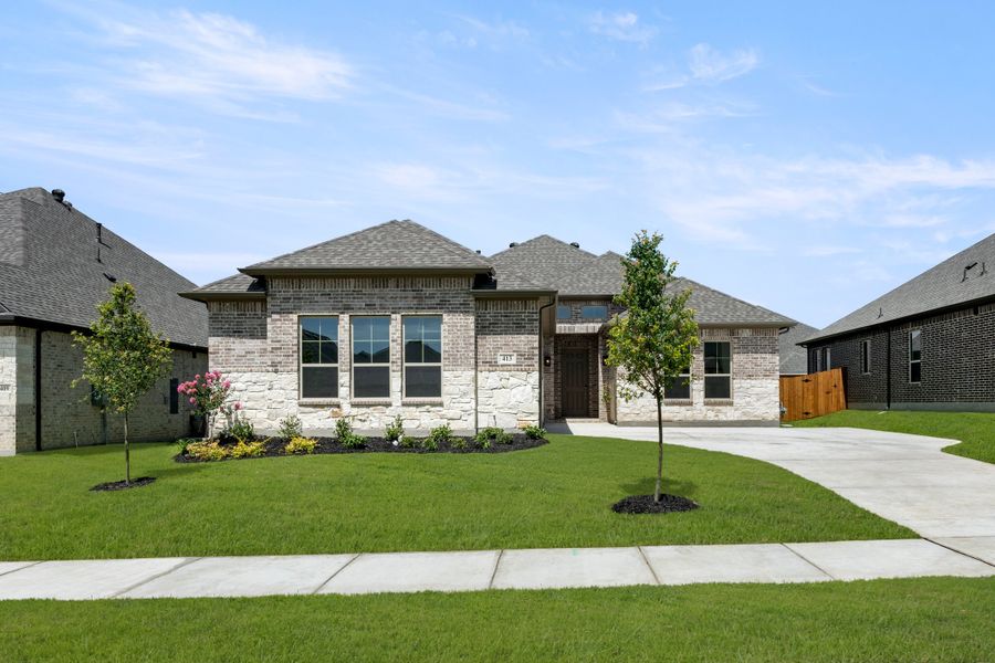 Front exterior of a new home in Sheppard's Place, Waxahachie, TX, highlighting curb appeal (Image 2). Front exterior of a new home in Sheppard's Place, Waxahachie, TX, highlighting curb appeal (Image 2).