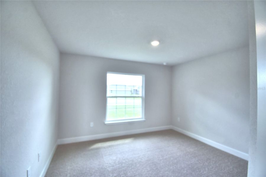 Spacious, unfurnished interior of a new home in Cadence Crossing, Auburndale (Image 22).