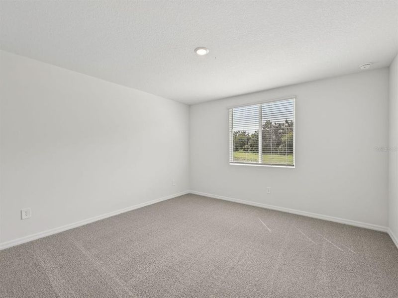Spacious, unfurnished interior of a new home in The Reserve at Van Oaks, Auburndale (Image 20).