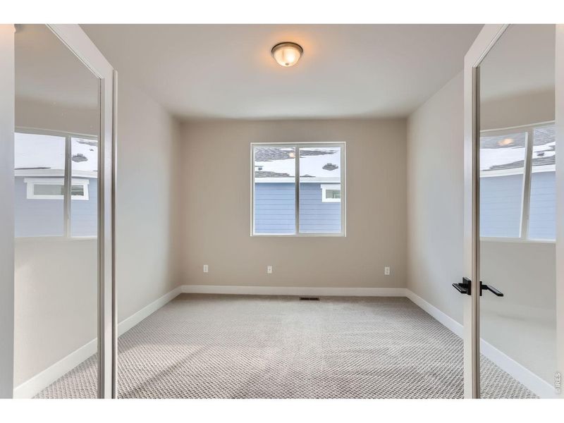 Spacious, unfurnished interior of a new home in Farmstead, Berthoud (Image 22).