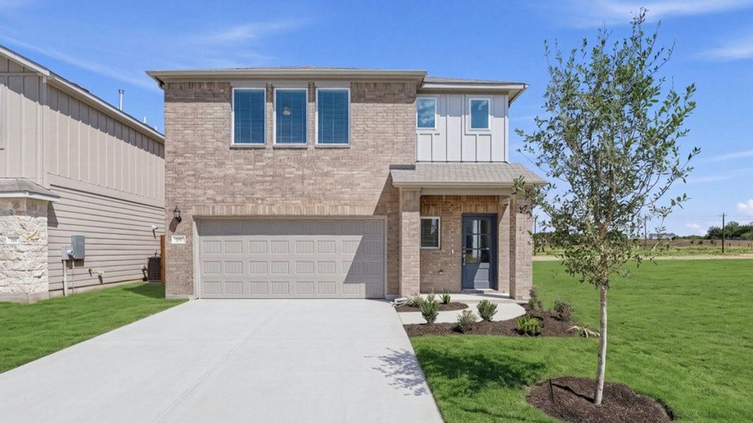 Front exterior of a new home in Sunfield, Buda, TX, highlighting curb appeal (Image 15).