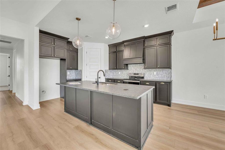 Please Note: These interior photos are not of the actual home but are of a completed one with a similar floor plan. Finishes, features, and layouts may vary.