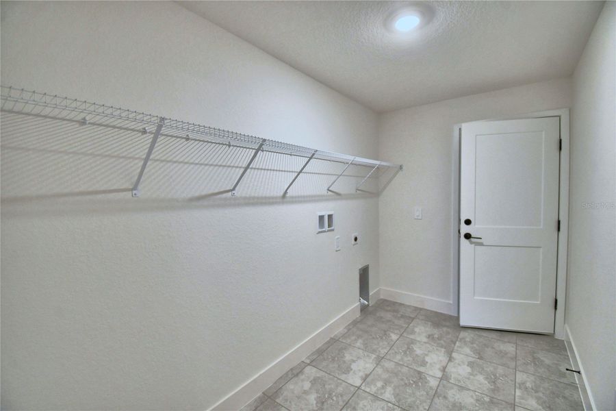Spacious, unfurnished interior of a new home in Cadence Crossing, Auburndale (Image 30).
