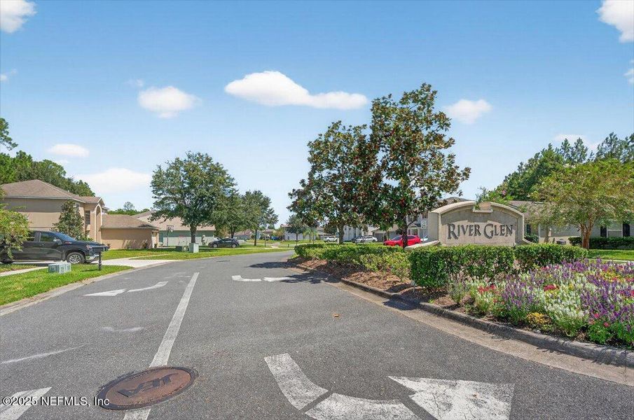 Front exterior of a new home in River Glen Express, Yulee, FL, highlighting curb appeal (Image 20).