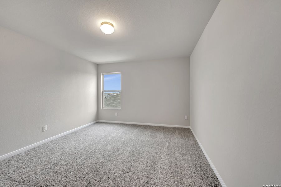 Spacious, unfurnished interior of a new home in Hunters Ranch, San Antonio (Image 31).