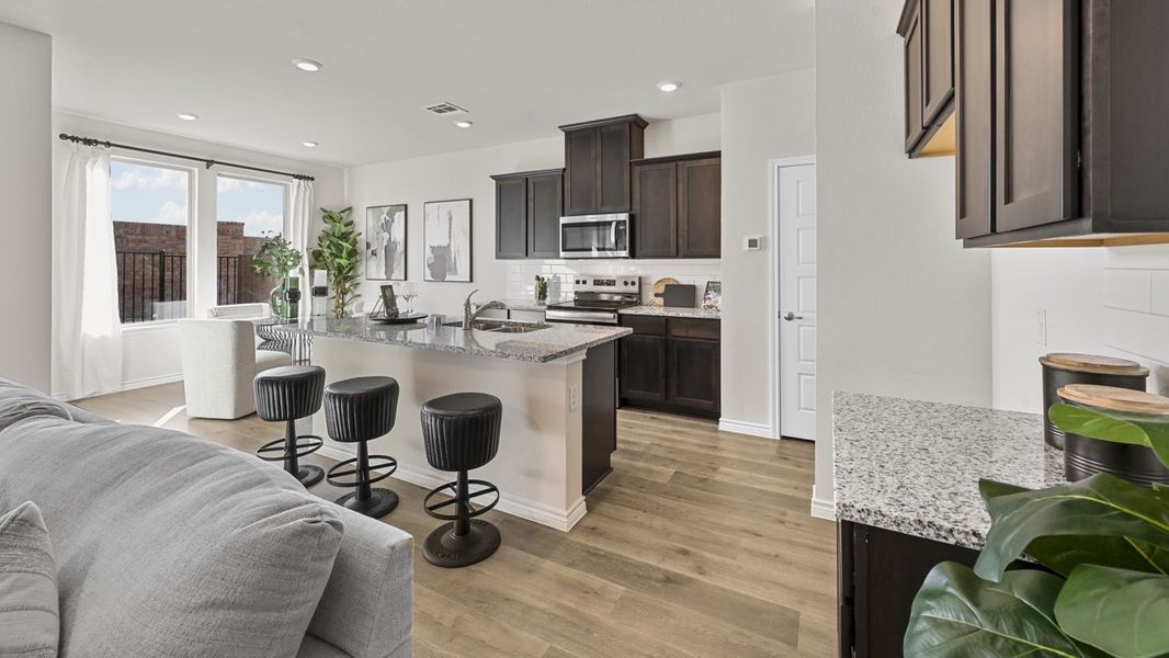 Furnished interior view inside a new home in The Villages of Hurricane Creek Townhomes, Anna (Image 2). Furnished interior view inside a new home in The Villages of Hurricane Creek Townhomes, Anna (Image 2).