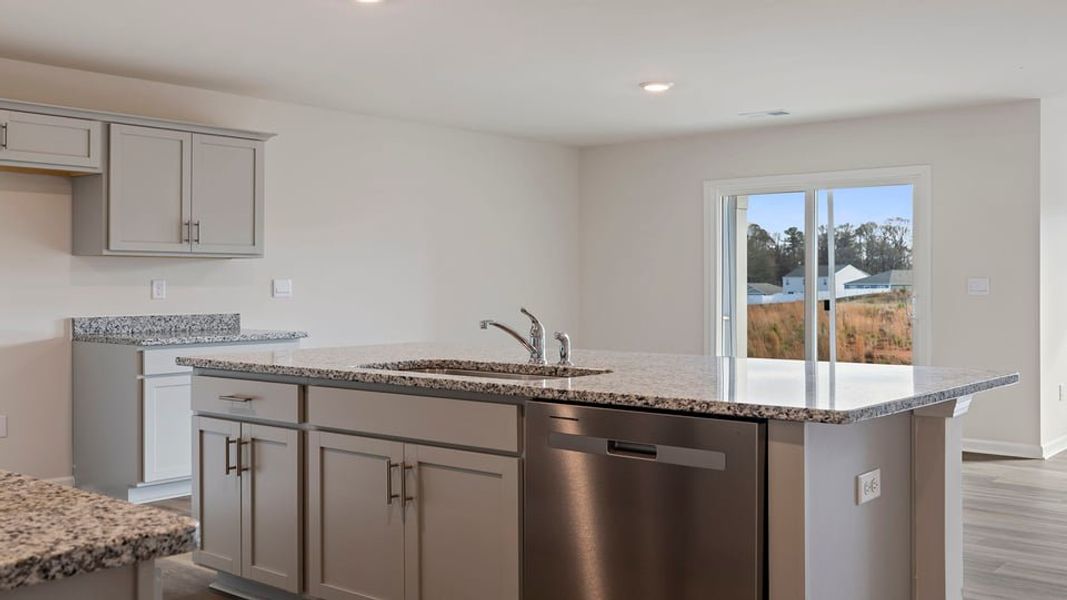 Furnished interior view inside a new home in Lakestone, Woodruff (Image 9).