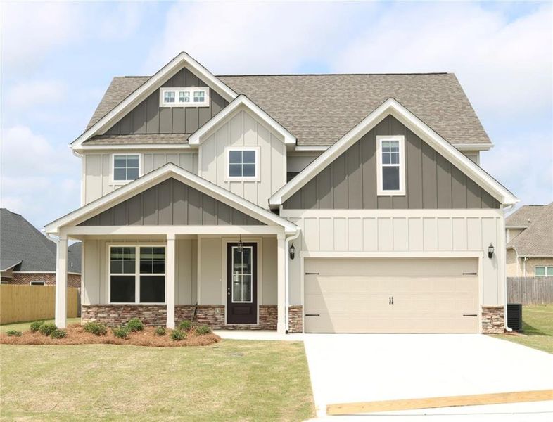 Front exterior of a new home in , Gray, GA, highlighting curb appeal (Image 1).
