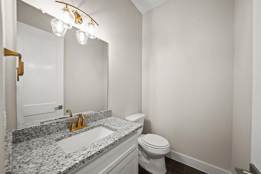 This well-appointed half bathroom is great for when you have family, friends, and guests over.