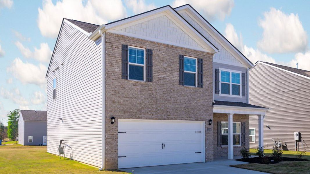 Front exterior of a new home in Hillcrest Landing, Cleveland, TN, highlighting curb appeal (Image 17).