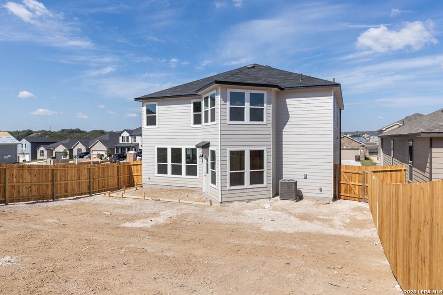 Exterior details and patio area of a home in Hidden Bluffs at TRP, San Antonio (Image 22).