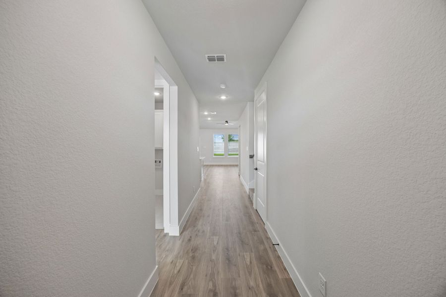 Spacious, unfurnished interior of a new home in Painted Tree Woodland West, McKinney (Image 31).