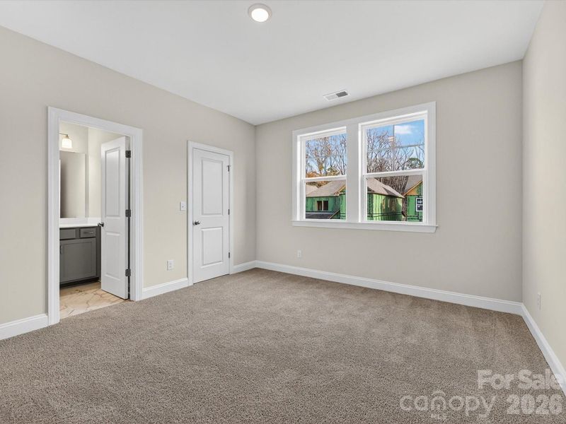 Spacious, unfurnished interior of a new home in North Creek Village, Huntersville (Image 37).