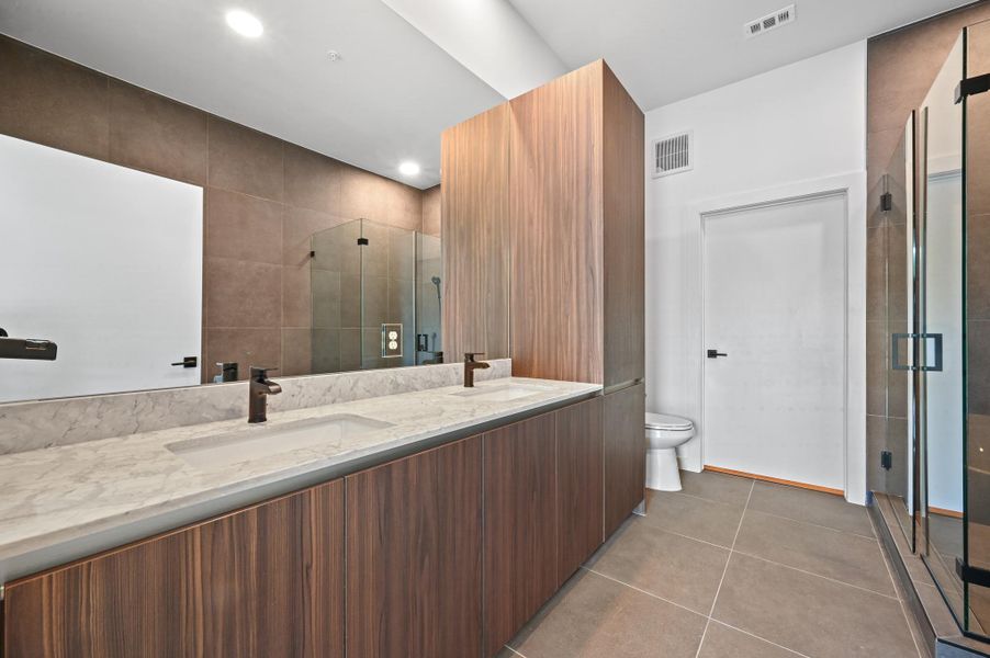 Furnished interior view inside a new home in One Oak, Austin (Image 15).