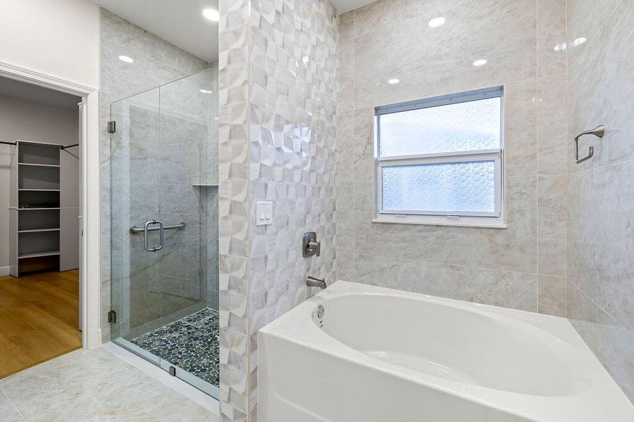 Primary Bath with large separate soaking tub.