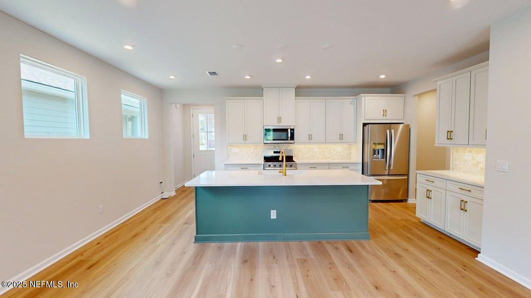 Furnished interior view inside a new home in RiverTown - WaterSong, St. Johns (Image 8). Furnished interior view inside a new home in RiverTown - WaterSong, St. Johns (Image 8).