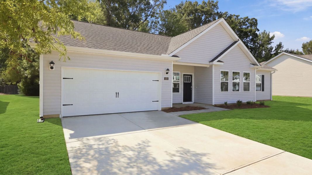 Front exterior of a new home in Tyler - Home on the Lake, New Bern, NC, highlighting curb appeal (Image 17).