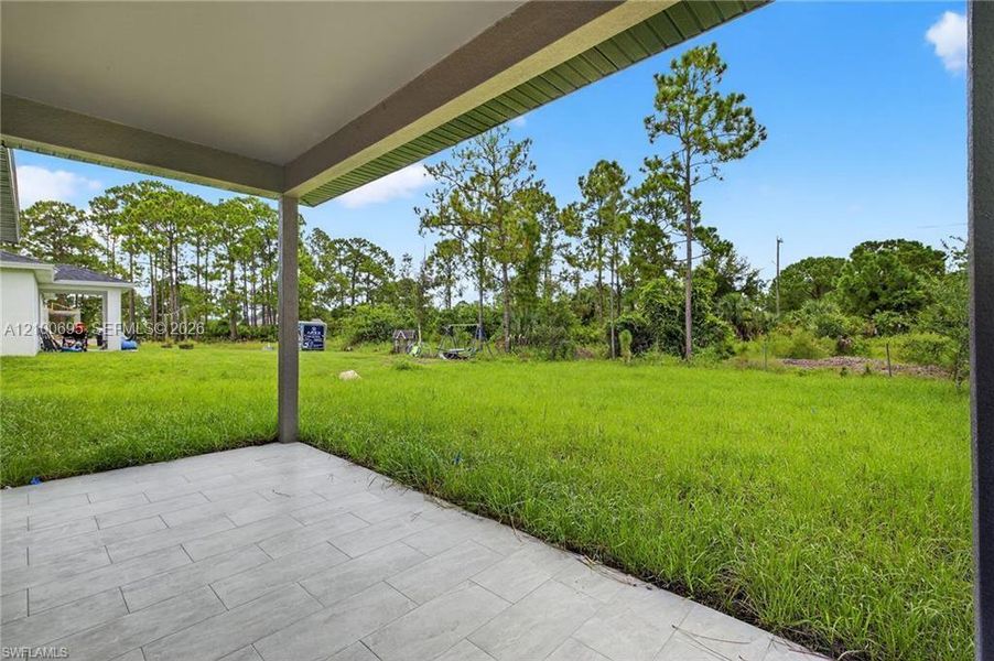 Exterior details and patio area of a home in , Lehigh Acres (Image 3).