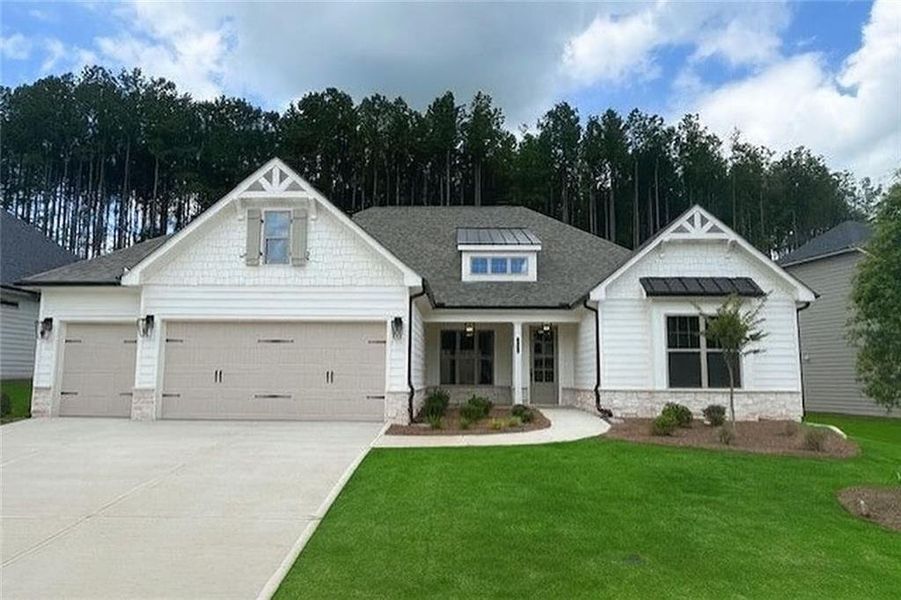 Front exterior of a new home in Soleil Belmont Park, Canton, GA, highlighting curb appeal (Image 1). Front exterior of a new home in Soleil Belmont Park, Canton, GA, highlighting curb appeal (Image 1).