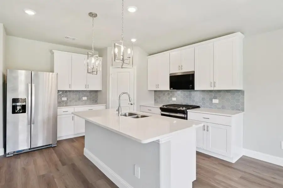 Photo is not of the actual home, but is an inspirational photo of builder’s model home and may depict options, furnishings, and/or decorator features that are not included.