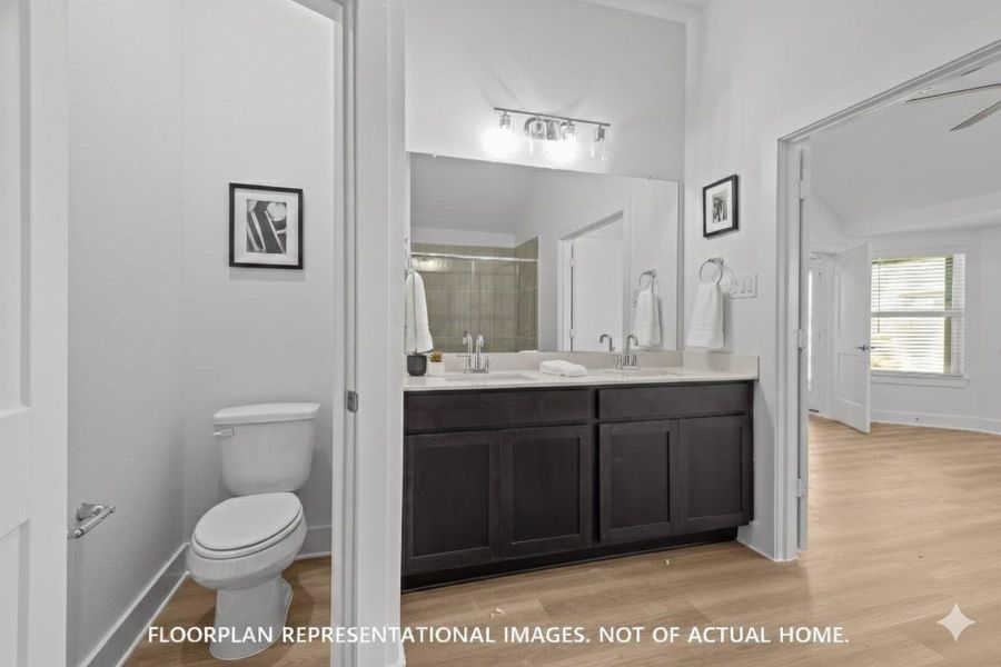 Furnished interior view inside a new home in Pinewood at Grand Texas, New Caney (Image 9).