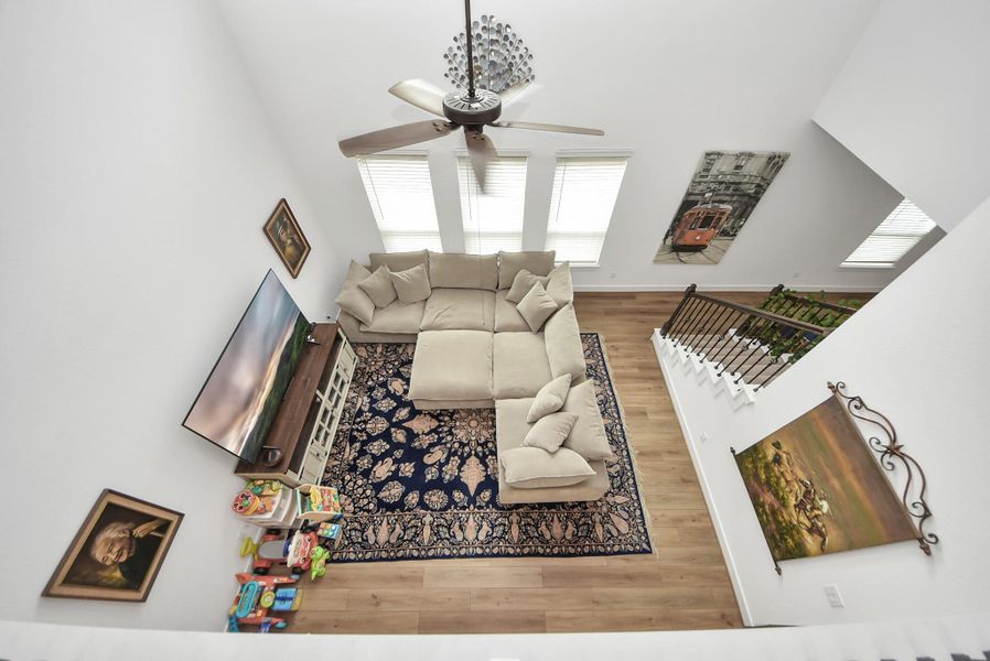 Second-floor vantage point highlighting the open-concept living room.