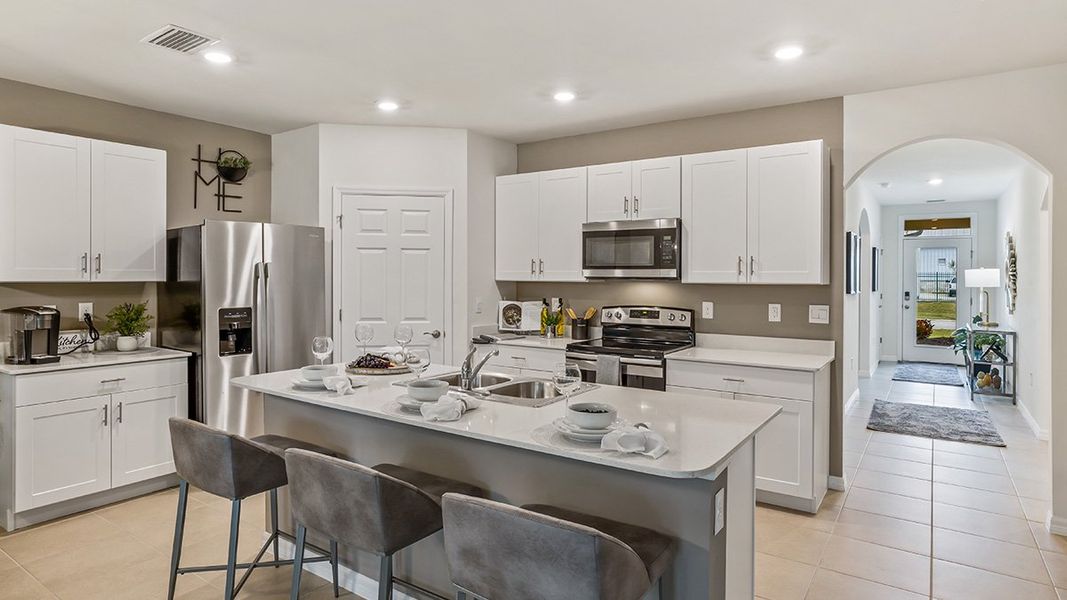 Representative furnished interior of a home built from the Cali by D.R. Horton in North Port - Express Series, North Port (Image 5).