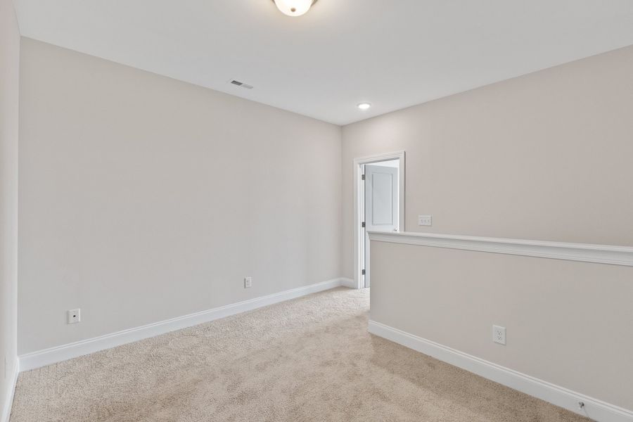 Representative unfurnished interior of a home built from the The Juniper by RobuckHomes in Kennebec Crossing, Angier (Image 117).