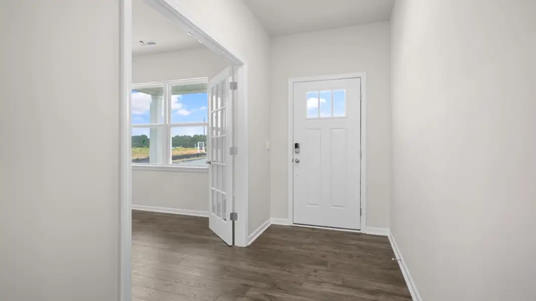 Spacious, unfurnished interior of a new home in The Reserve at Prestleigh, Wake Forest (Image 8).