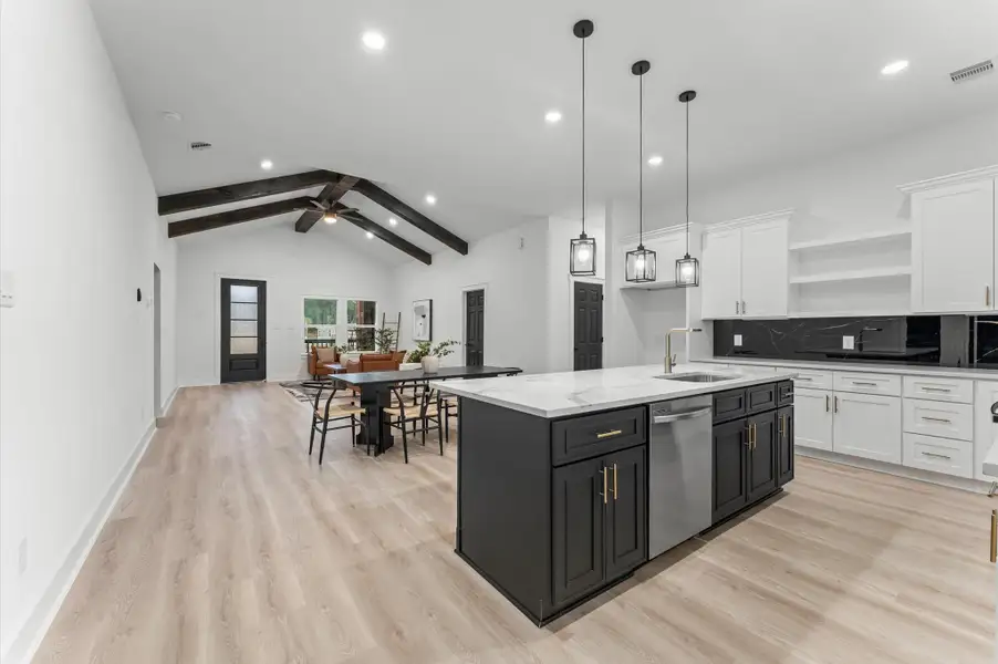 Open layout connecting perfectly to the dining and living spaces. Open layout connecting perfectly to the dining and living spaces.